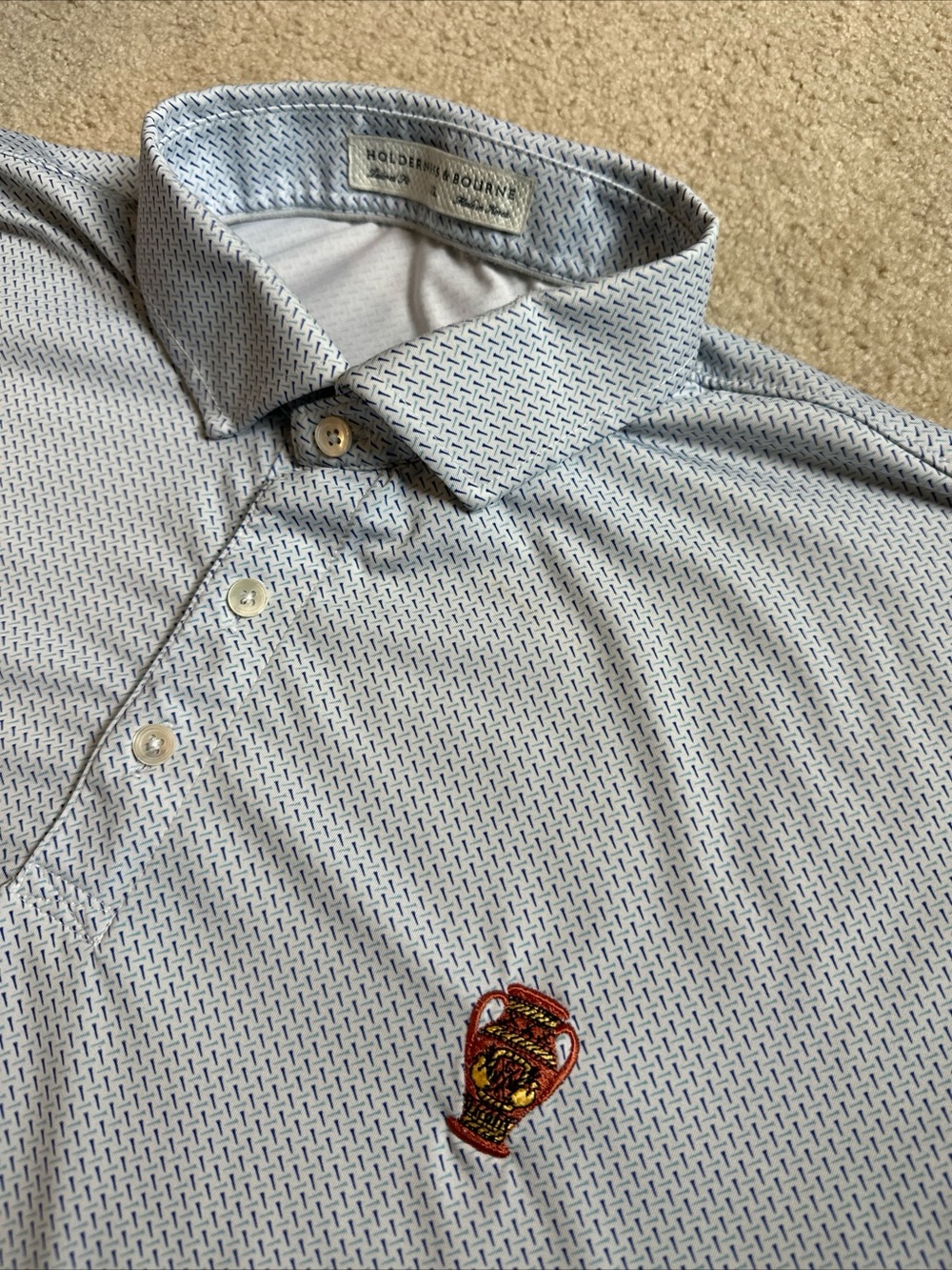 Holderness & Bourne Terra Cotta Invitational Logo Hicks Golf Tee Patterned Polo